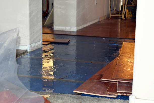 Professional Flood Damage Restoration technician working in Ashaway, RI